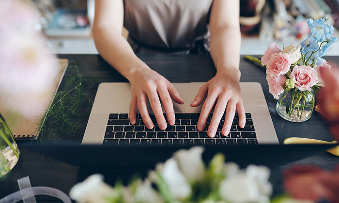 floral shop owner managing bank account online