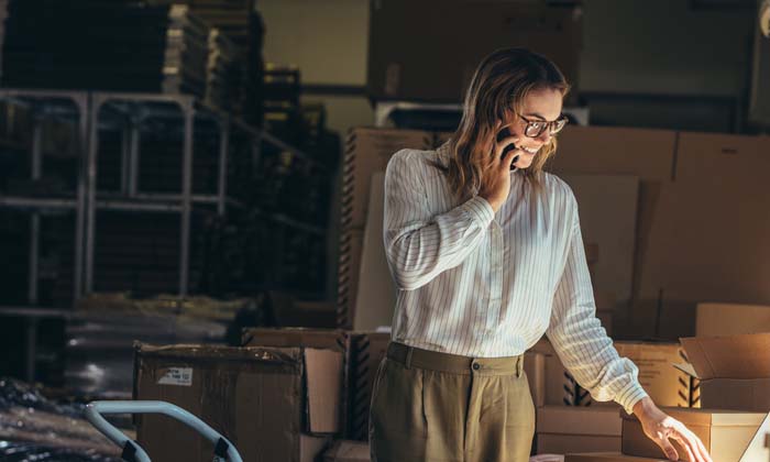 business owner checking on an order for a client