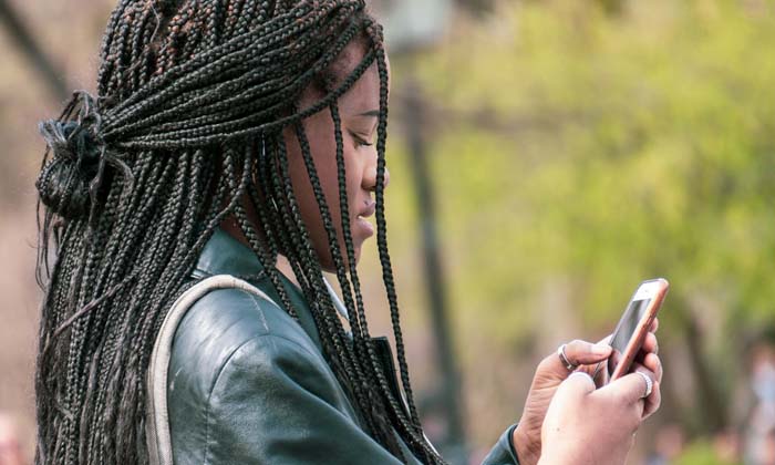 woman using her app to check her bank account