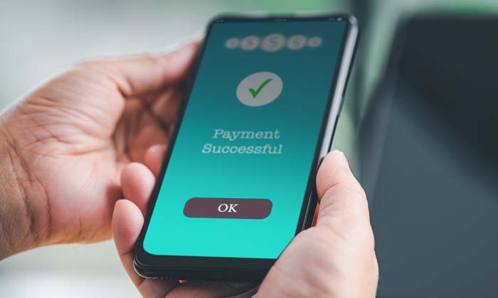 person getting paid virtually on their phone