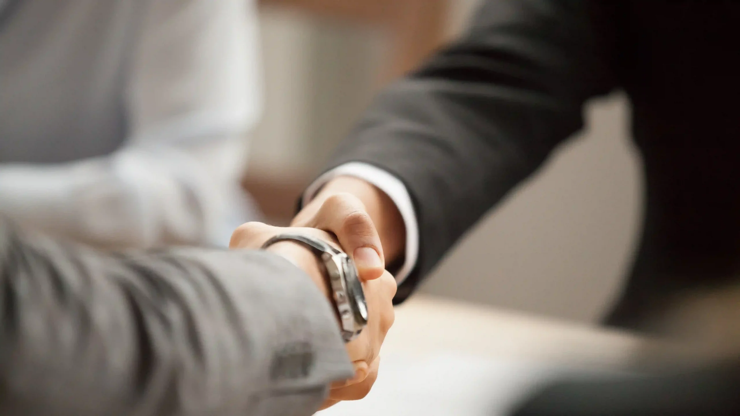 holding a cell phone over a check to make a deposit