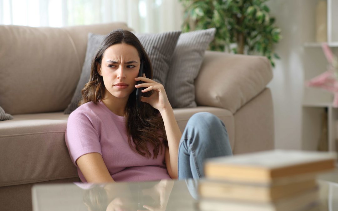 woman receiving suspicious phone call