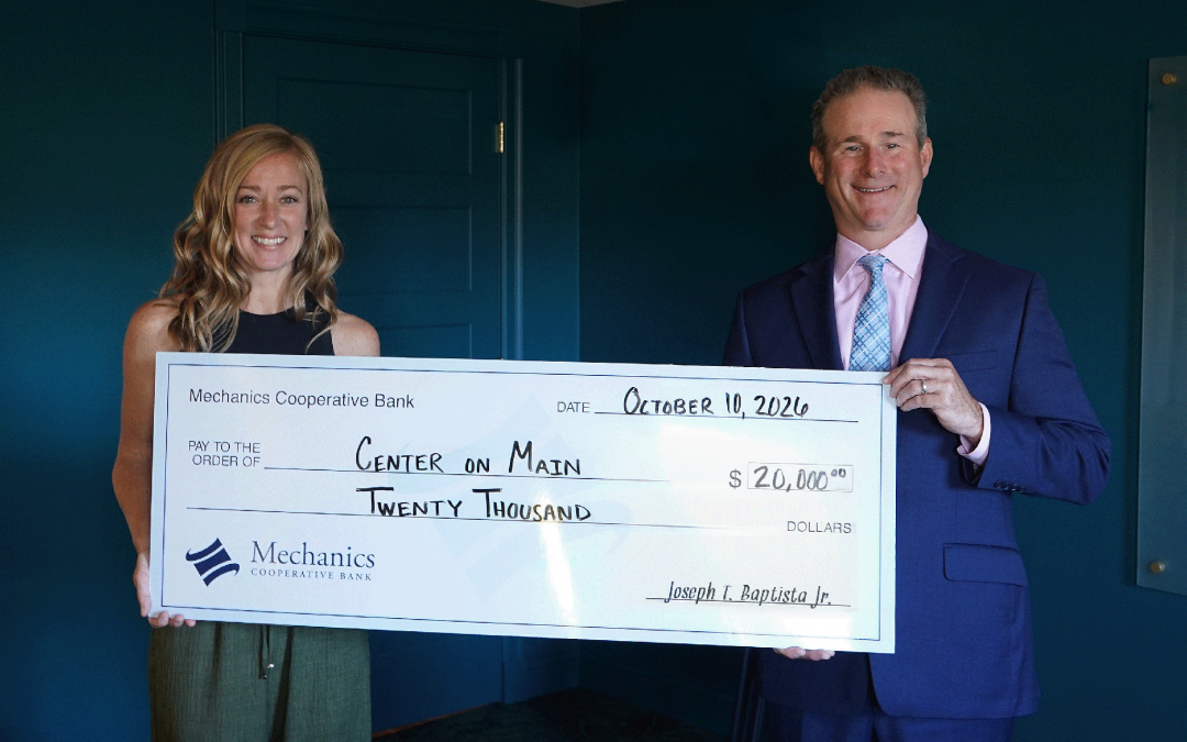Michelle Stratton, President of The Center on Main, is pictured with Joseph T. Baptista Jr., President and CEO of Mechanics Cooperative Bank, in one of the newly furnished multipurpose rooms.